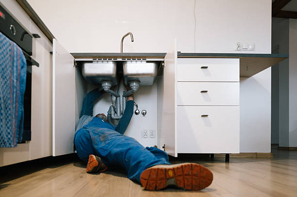 Professional Plumbing technician working in Somerville, IN